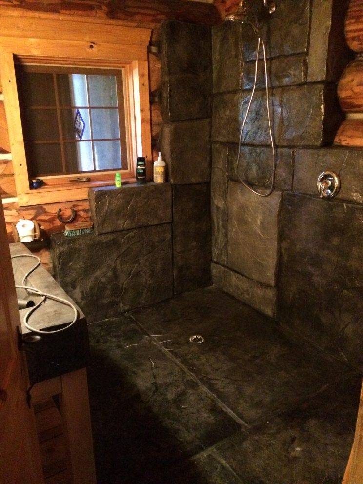 Poured concrete shower and bathroom floor